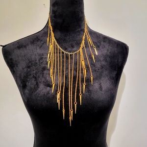 Dangling gold necklace
